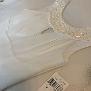 Never worn!! White Trina Turk dress with beads. Gorgeous